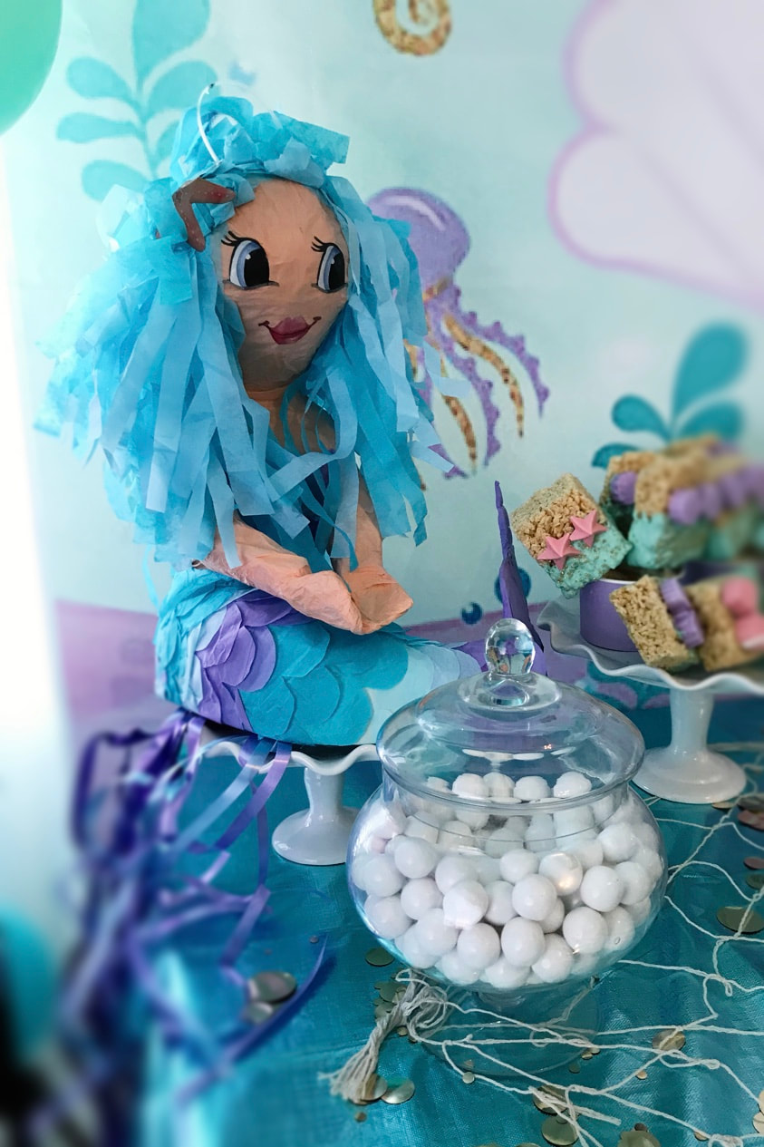 Mermaid string piñata at Mermaid Birthday Party - Land of Lloyds