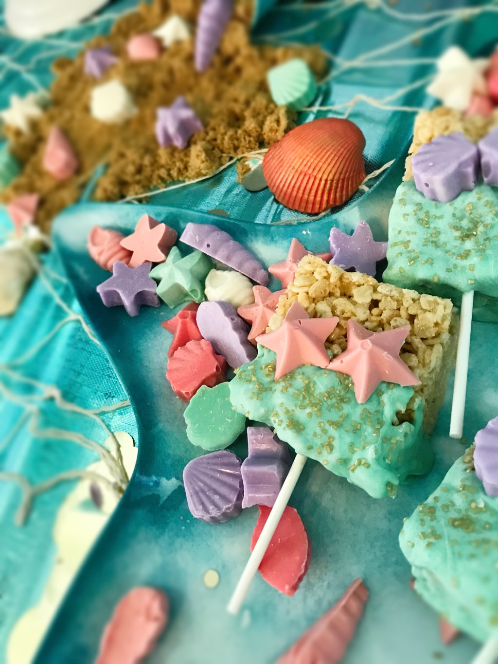 Mermaid Rice Krispies Treats and Chocolate Seashell Candy for Mermaid Birthday Party - Land of Lloyds