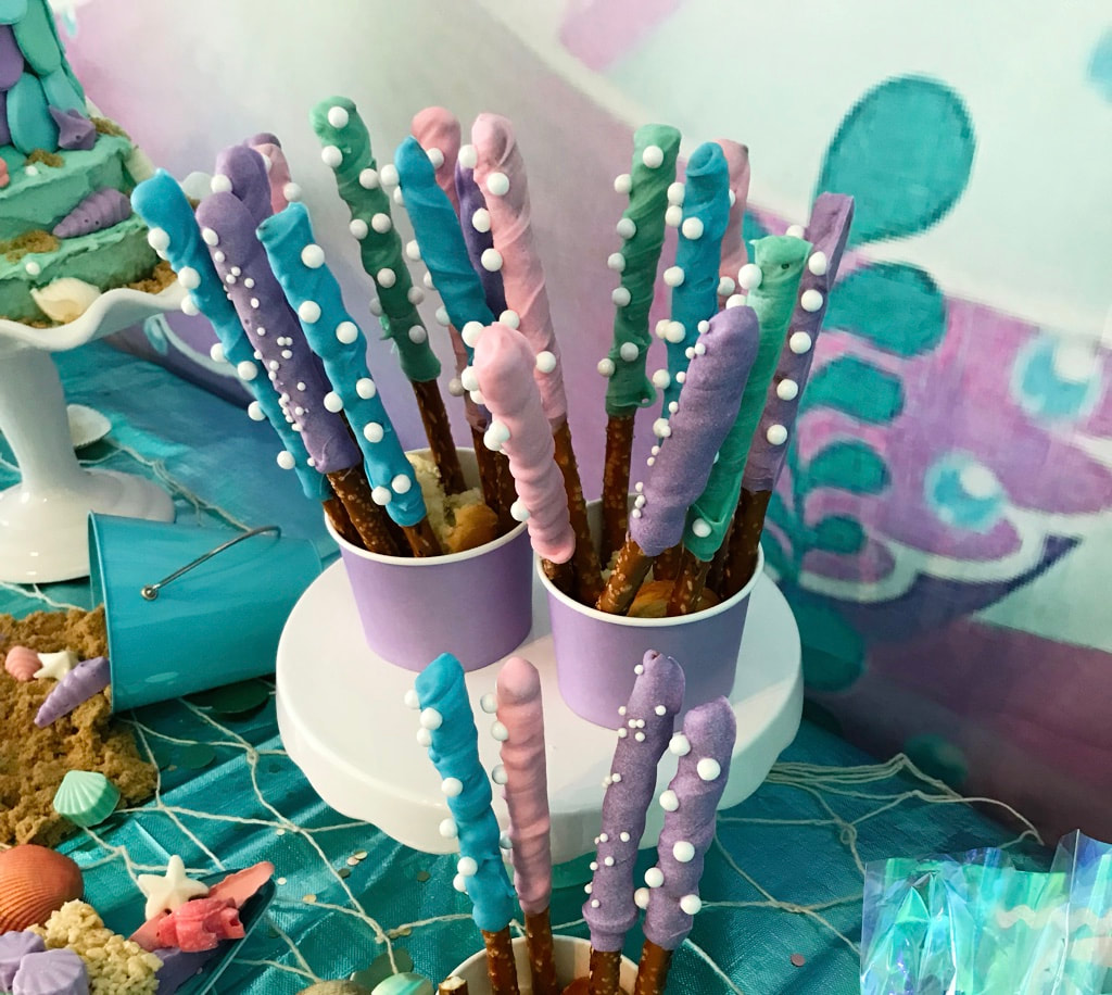 Mermaid Birthday Party Chocolate Covered “Coral” Pretzel Sticks Table - Land of Lloyds